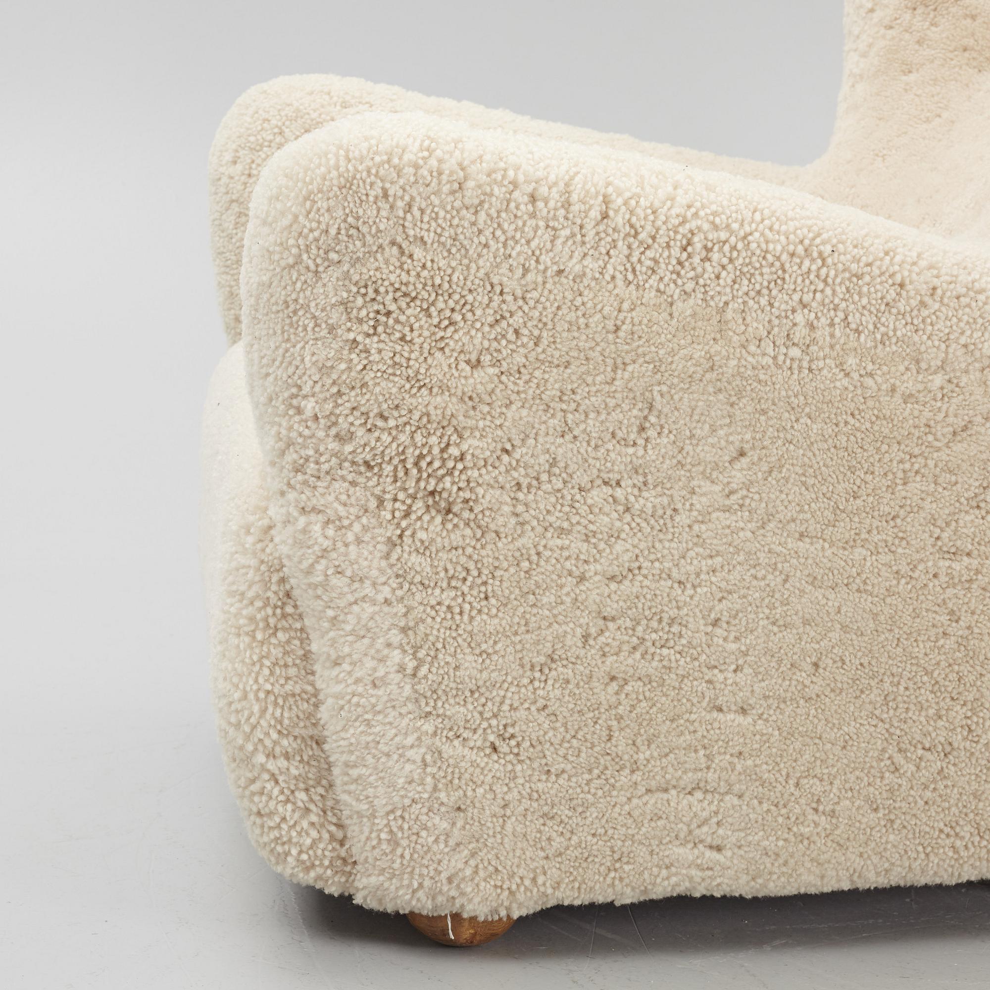 A pair of Danish Modern sheepskin armchairs, 1930's/40's.