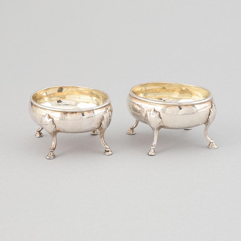 A pair of silver saltcellars, London, England.