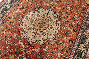 A part silk Tabriz carpet, c. 268 x 179 cm.