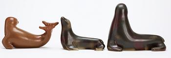 Three Gunnar Nylund stoneware figures of seals, Rörstrand.