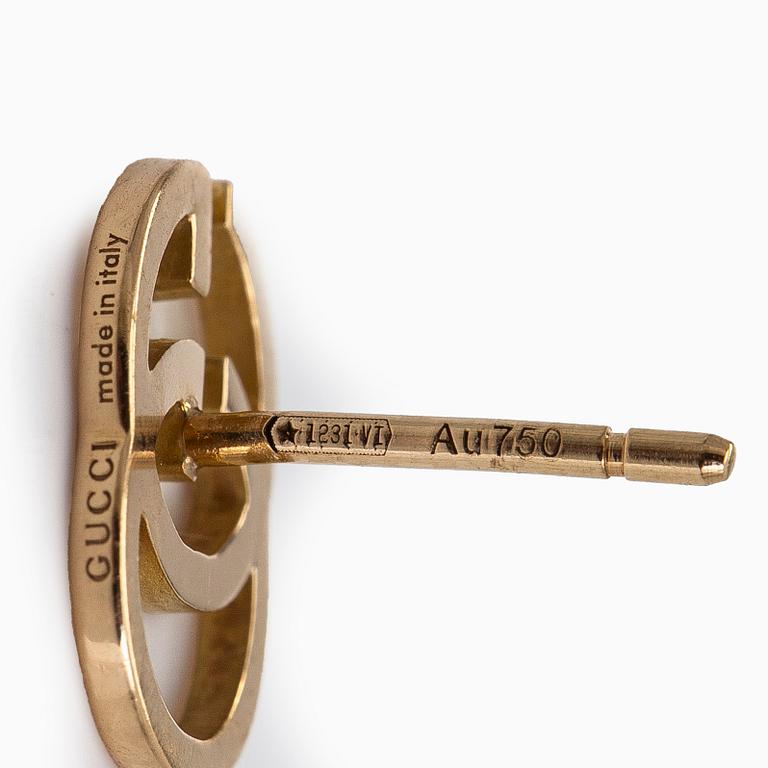 Gucci, a pair of 18K gold "GG Running" earrings.