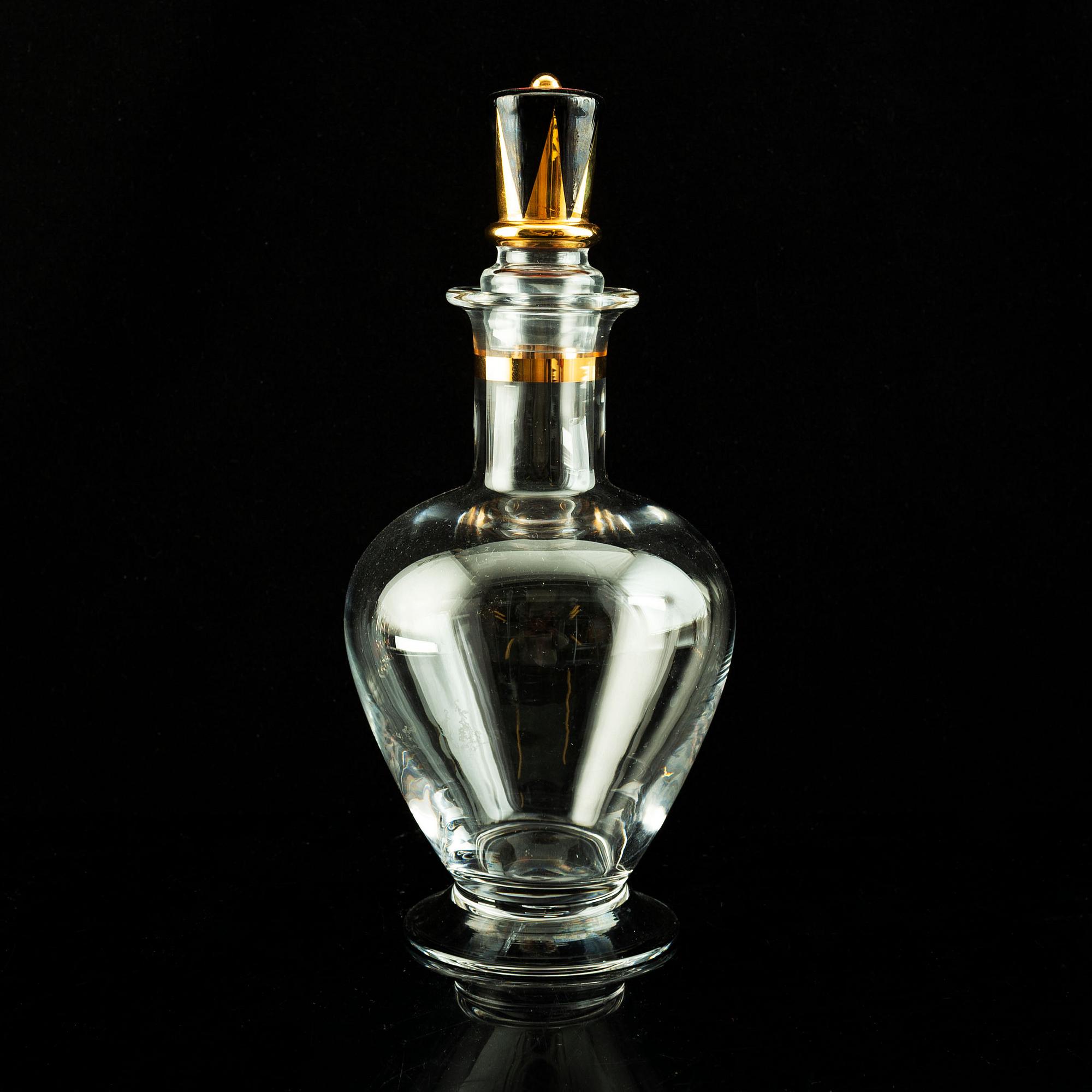 Gunnar Cyrén, a set of six "Devil" shot glasses and a decanter from the "Nobel" series, Orrefors Sweden post 1996.
