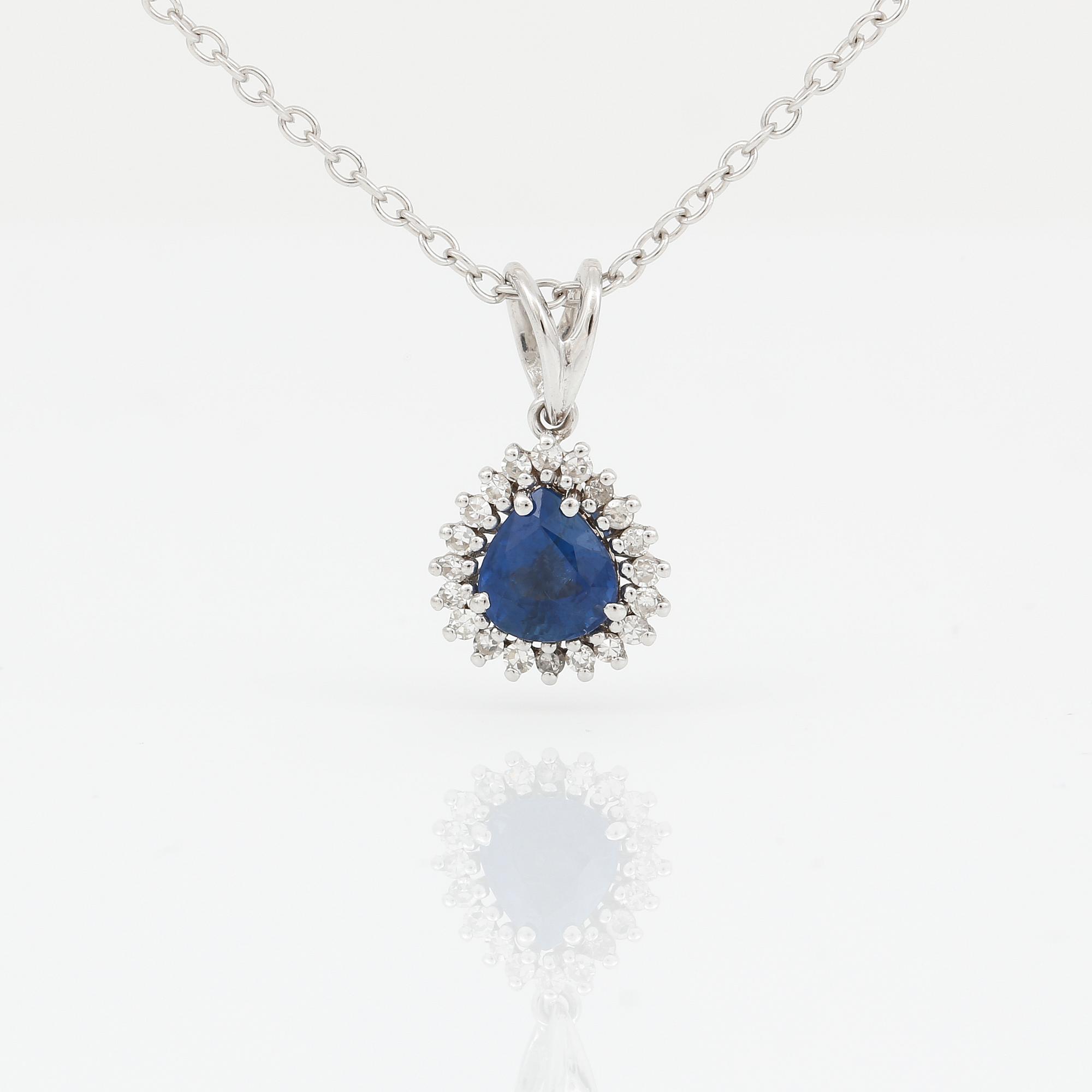 HÄNGE, 18K vitguld med droppformad safir 1,09 ct och åttkantslipade diamanter tot ca 0,17 ct. Vikt 4,09 g.