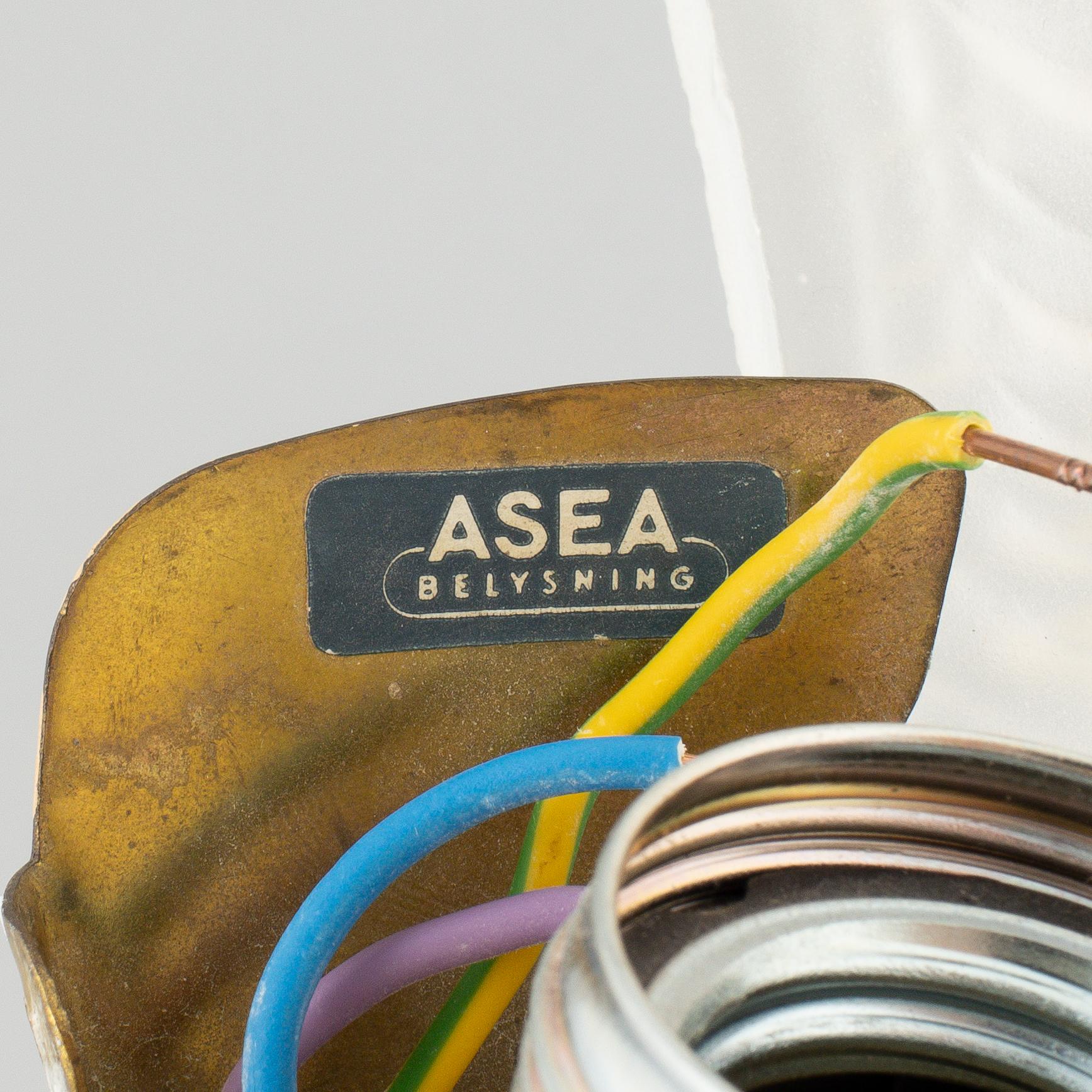 Asea, a set of eight 'Coquille' wall lights, Sweden, 1940's.