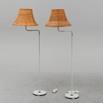 A pair of late 20th Century floor lights.