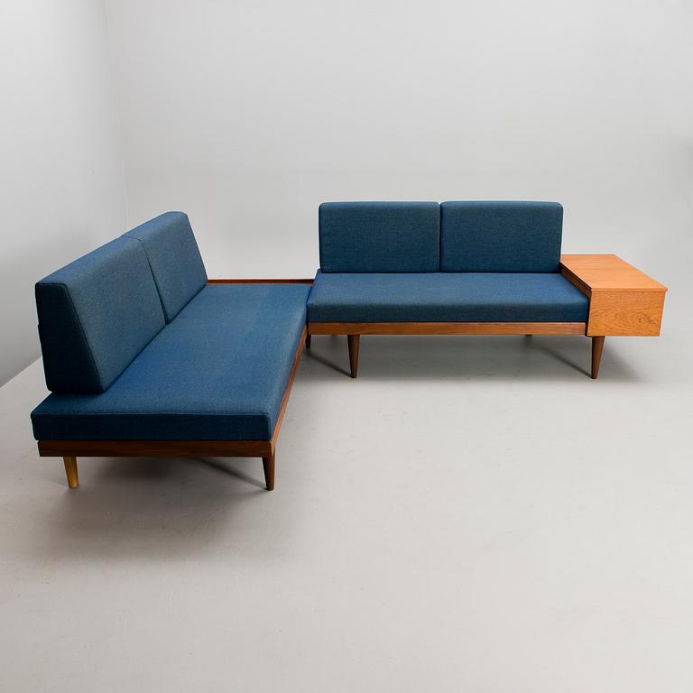 A corner sofa, mid 20th century.