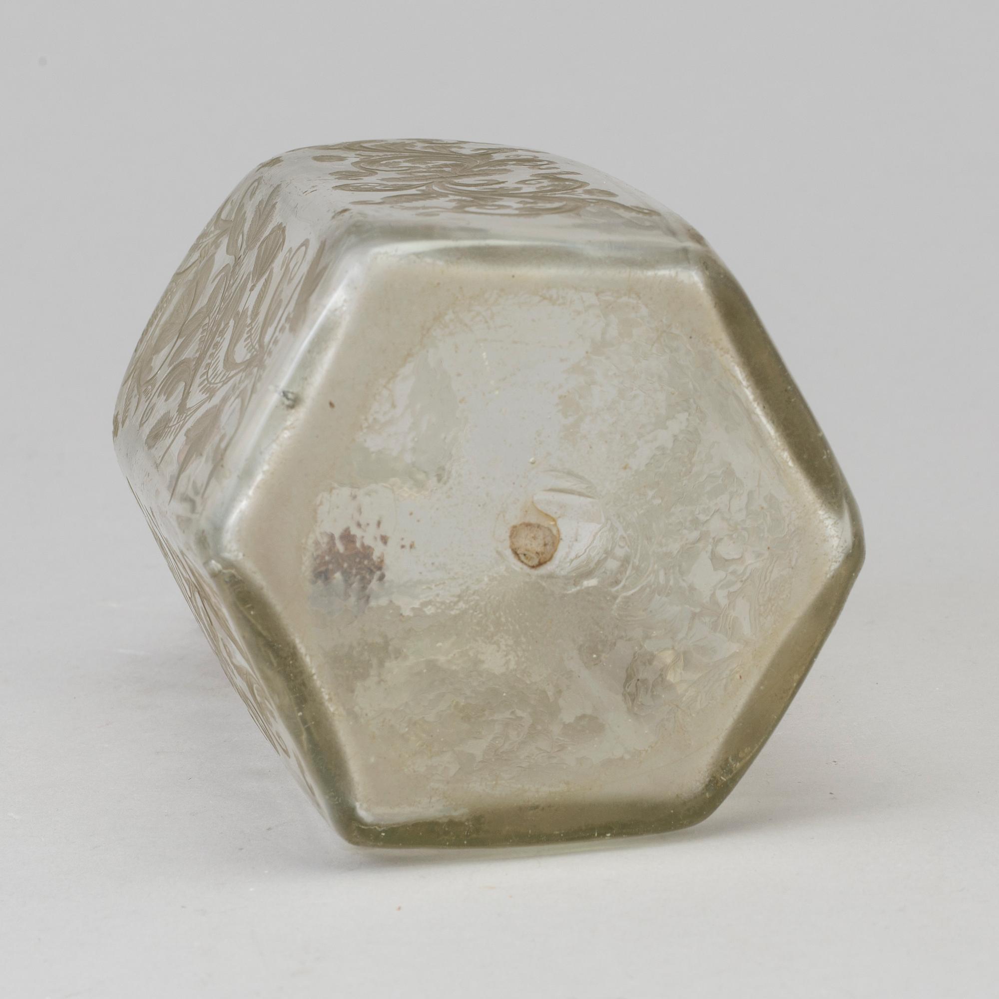 A baroque glass bottle, first half of the 18th century.