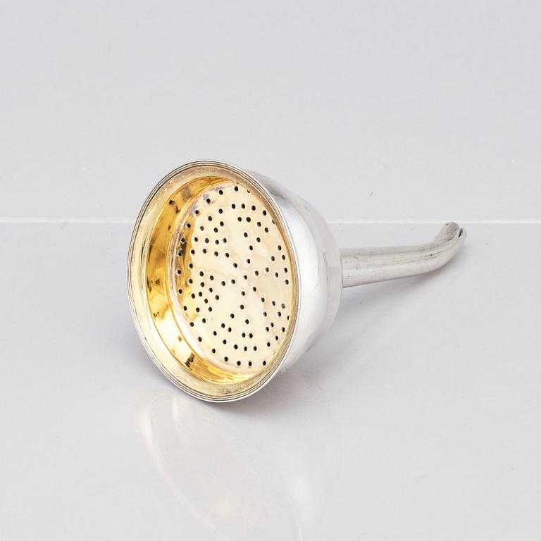 A Swedish 19th century parcel-gilt silver wine-strainer, mark of Johan Petter Grönvall, Stockholm 1822.