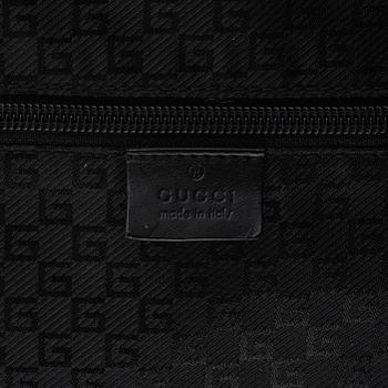 Gucci, suitcase/cabin bag.