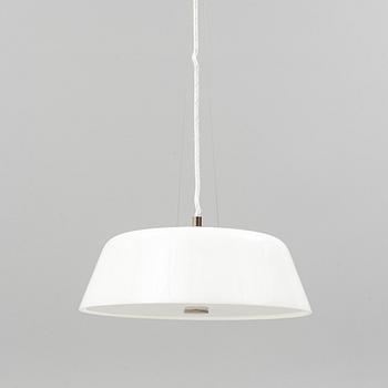 An Arne Jacobsen "Centenary Package" comprising three "Ant Chairs" and an eggshaped table, Fritz Hansen, Denmark.