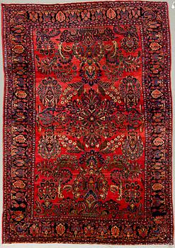 A semi-antique Sarouk, aroud 330 x 224 cm.