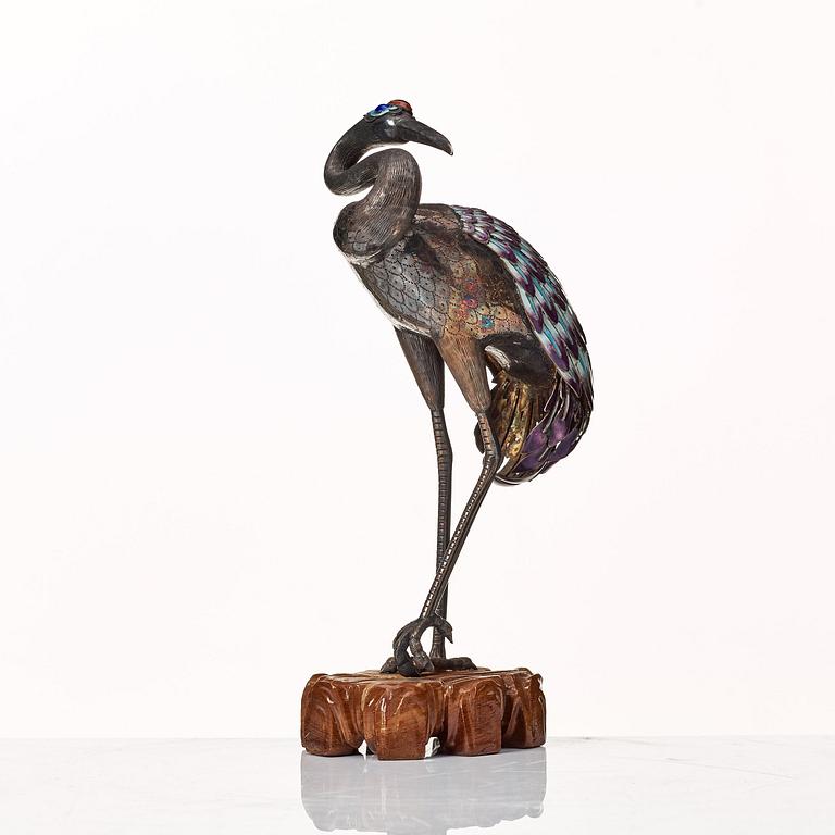 A silver and enamel figure of a crane, first half of 20th Century.