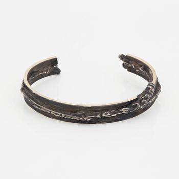 Copula, silver, två armband och en ring.