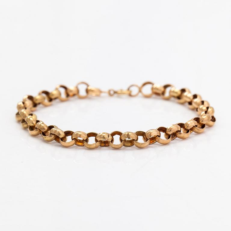 A 14K gold bracelet.