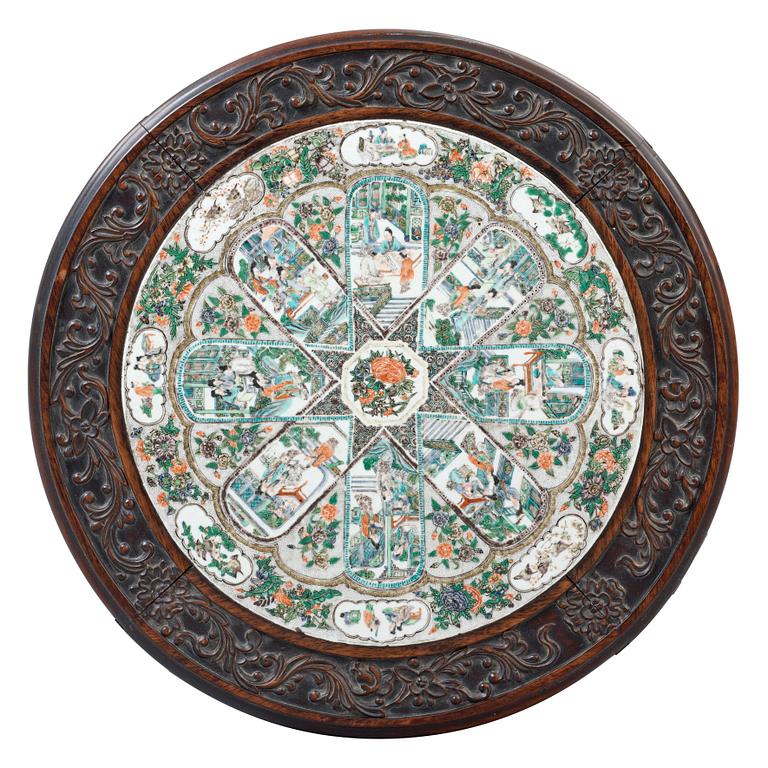 A hardwood and porcelain plaquette in famille verte  table, Qing dynasty 19th century.