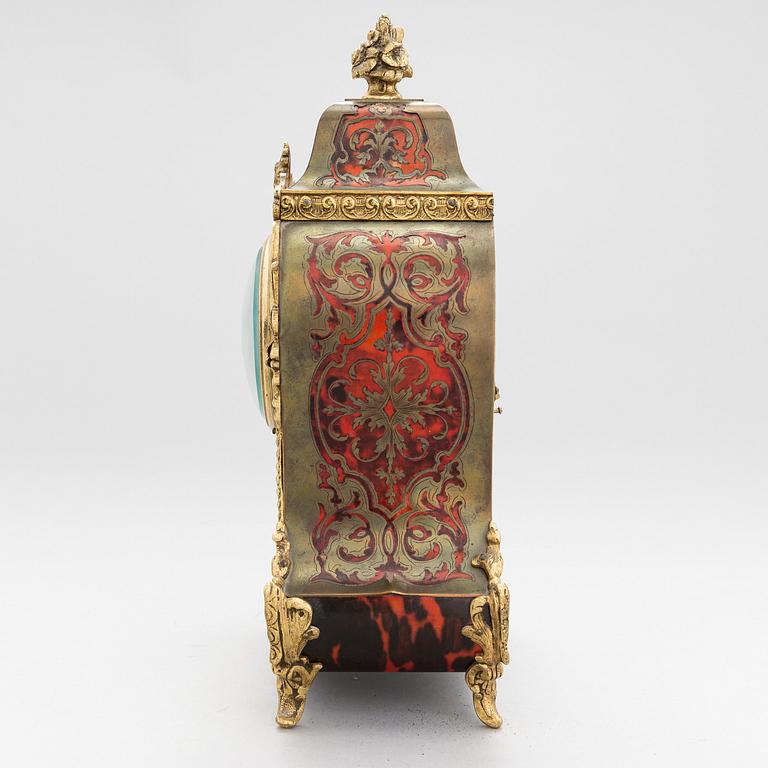 A French boulle style mantel clock, late 19th Century.