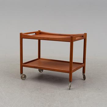 A mid 20th century teak serving trolley by Hans J Wegner, Andr. Tuck, Denmark.