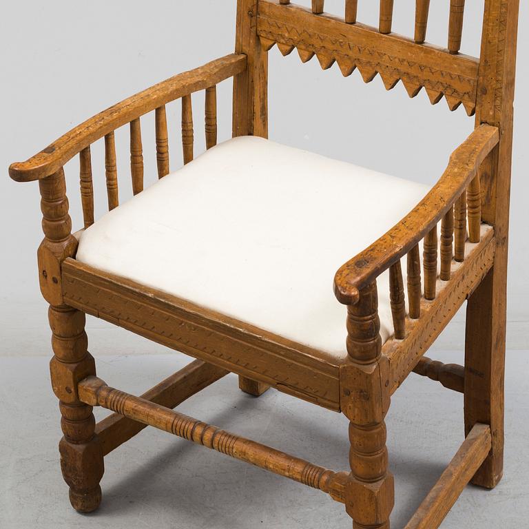 A 18th/19th century wooden chair.