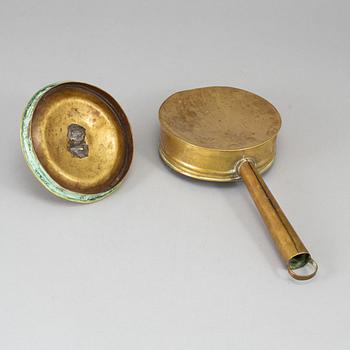 An 18th century brass nignt light holder.