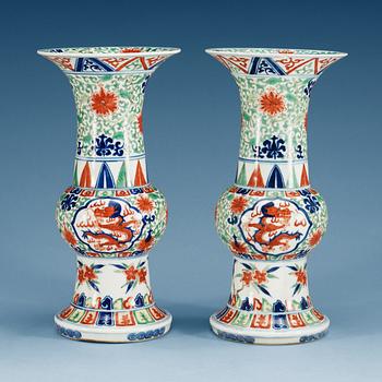 1665. A pair of wucai vases, Qing dynasty, presumably Yongzheng with Wanli six character mark.