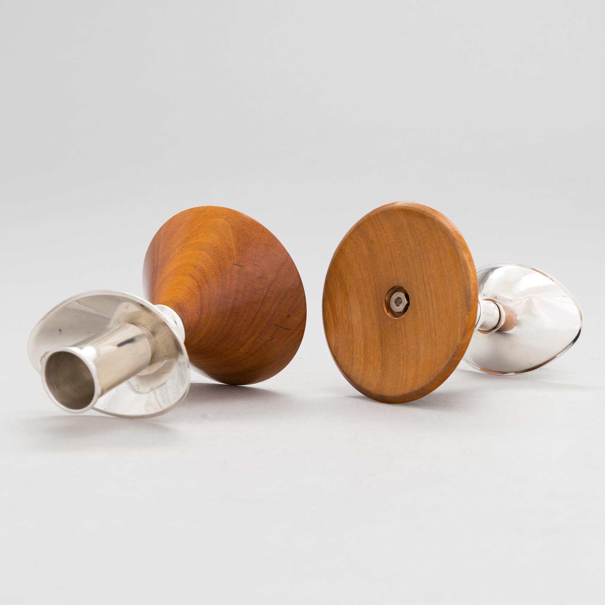 Anna-Greta Eker, A set of two silver and mahogny candlesticks, Auran Kultaseppä, Turku 1963.