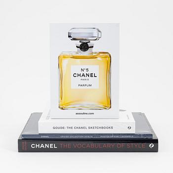 Chanel, four coffee table books.