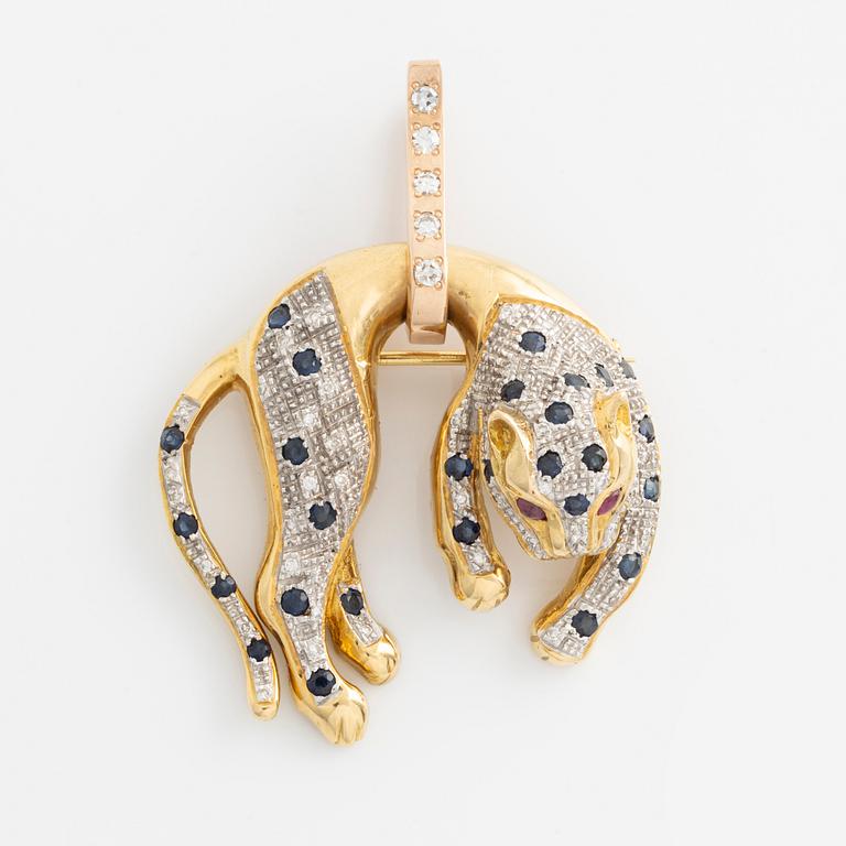 Brooch/pendant in the shape of a feline animal, gold with sapphires, rubies, and brilliant- and octagon-cut diamonds.