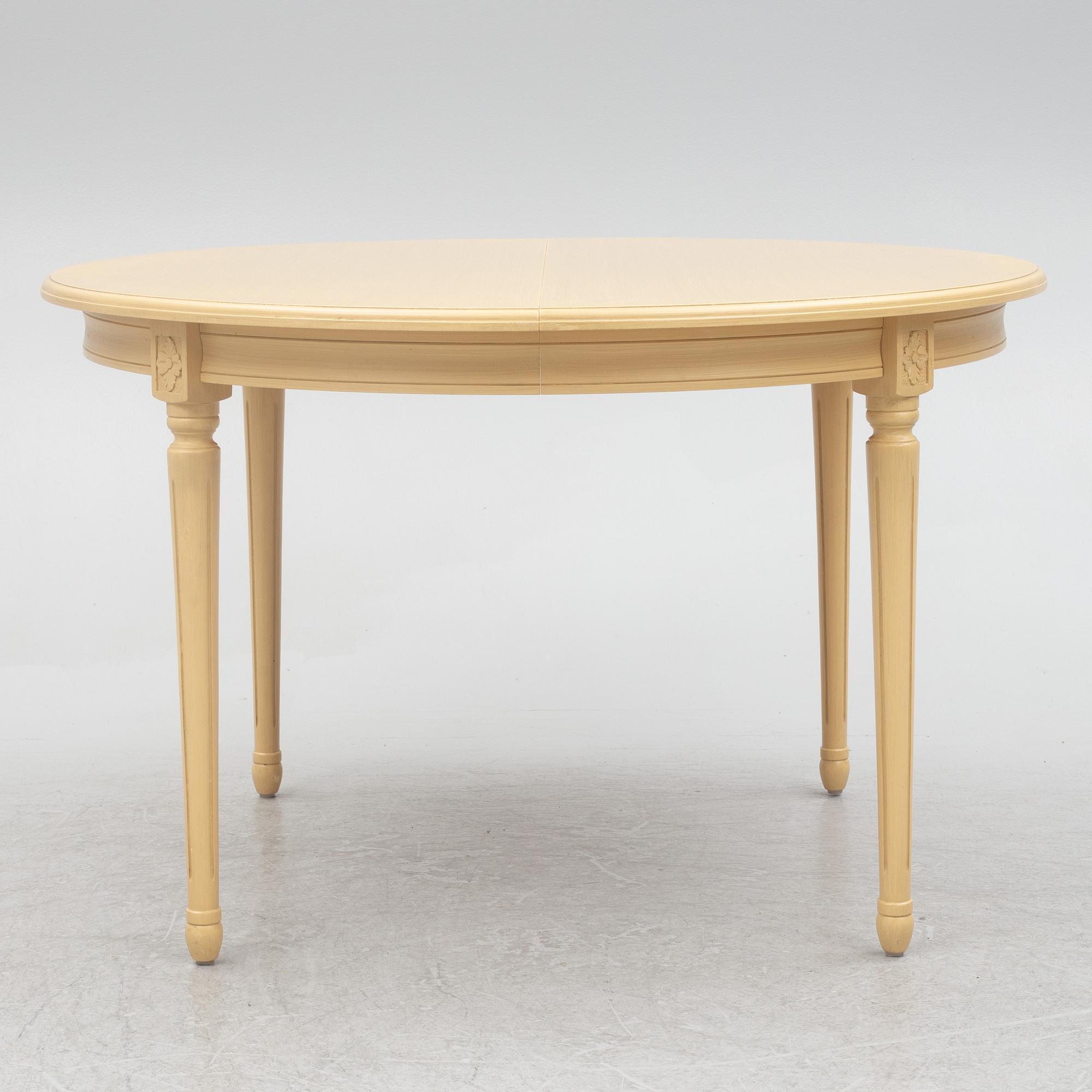 A Gustavian style dining table with six dining chairs, Sweden, 21st century.