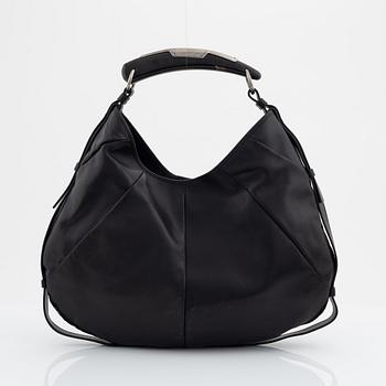 Yves Saint Laurent, a black leather and horn hobo bag.