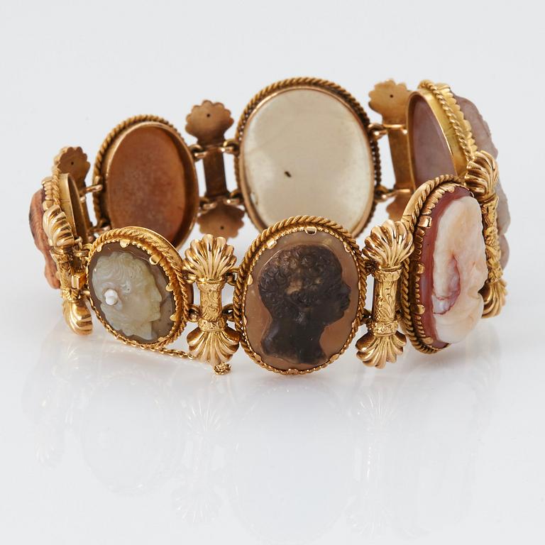 A BRACELET set with seven hardstone cameos.