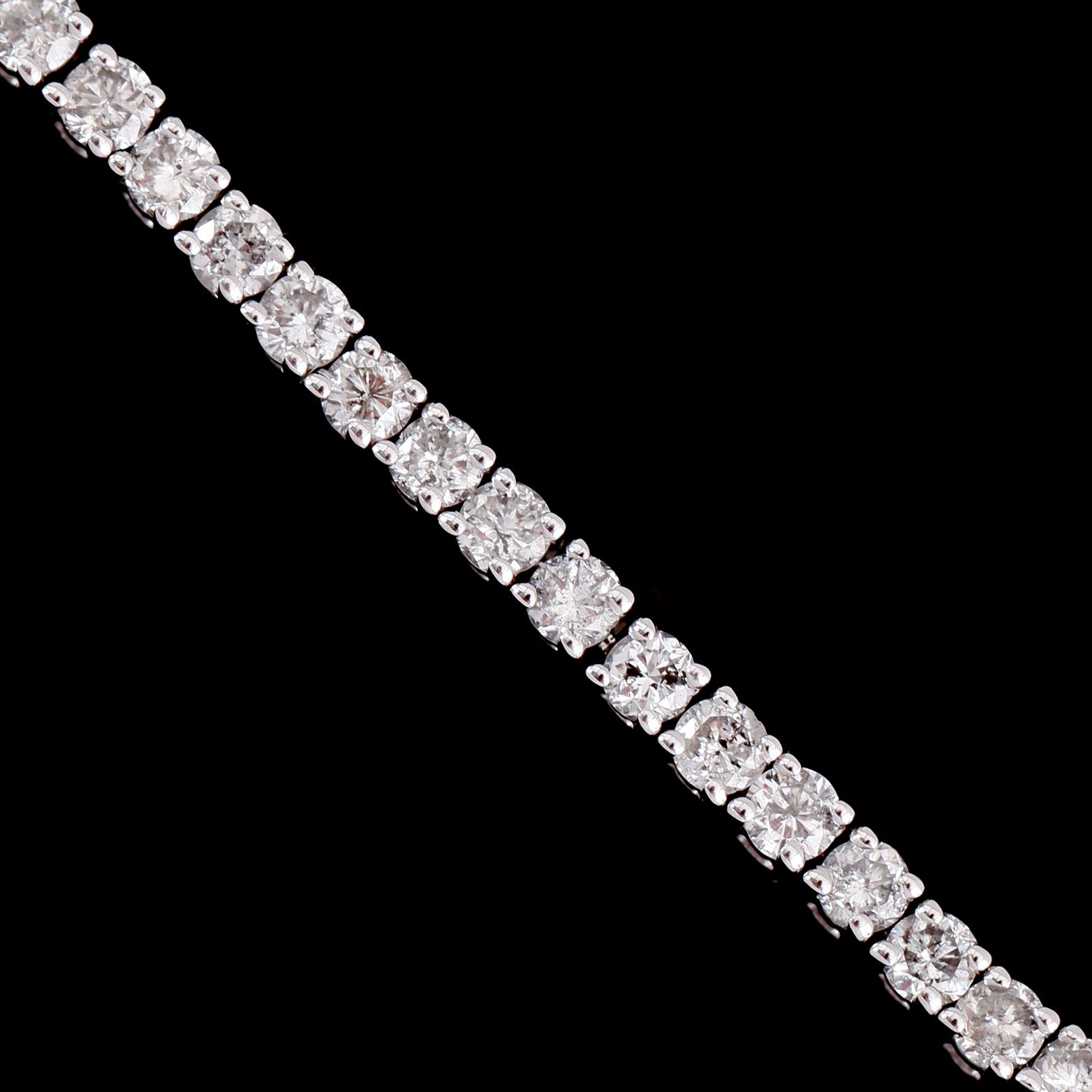 ARMBAND, 14 k vitguld, Rivière, briljantslipade diamanter tot ca 4.72 ct.
