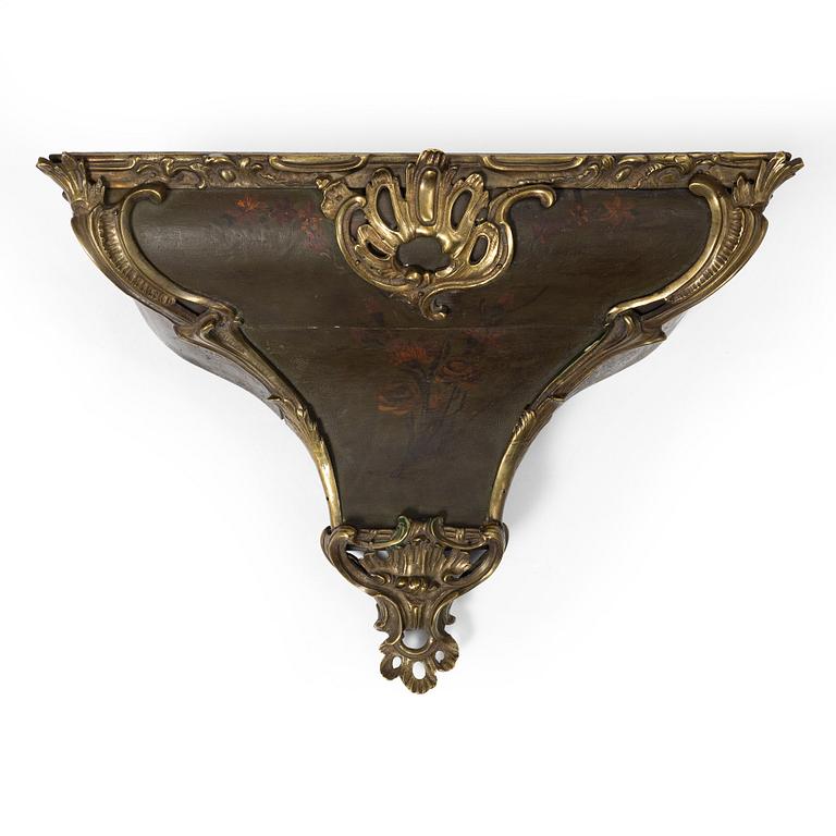 A presumably French Louis XV bronze-mounted console, mid 18th century.