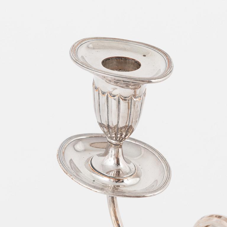 A pair of silver plated candelabra/candlesticks, England, first half of the 20th Century.