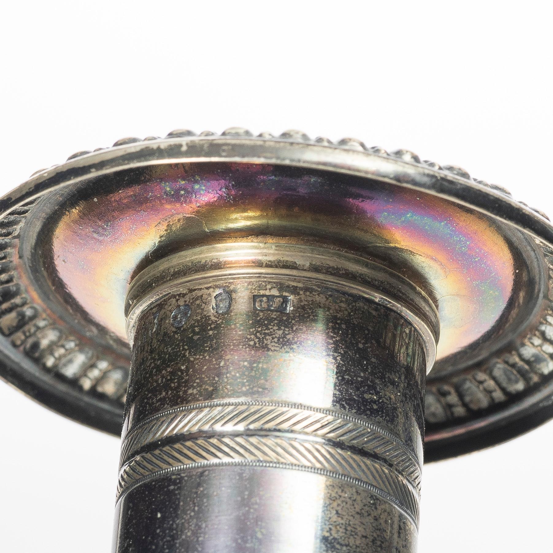 Four pairs och Swedish silver candlesticks, 19th-20th century.