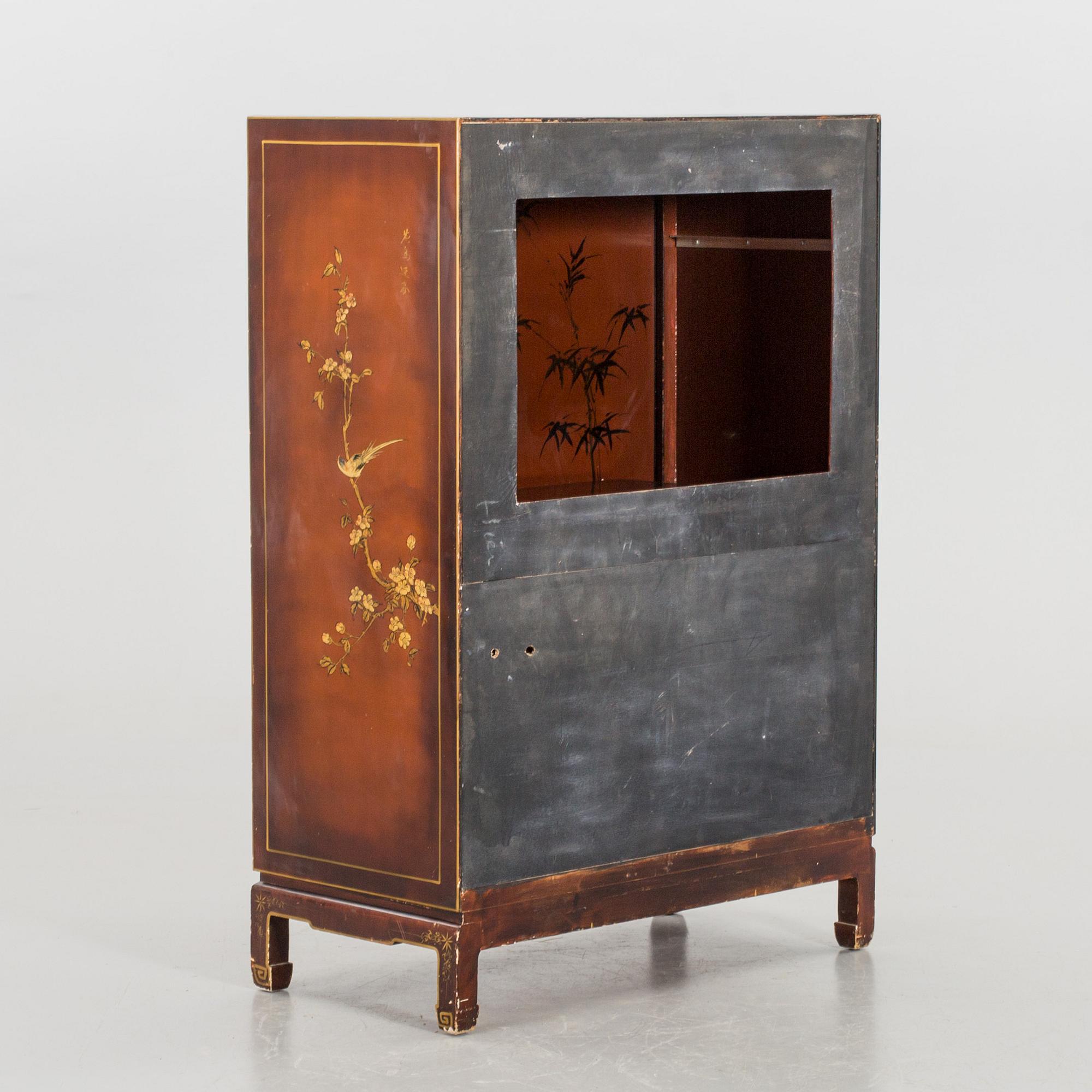 A Chinese style cabinet, later part of the 20th cwentury.