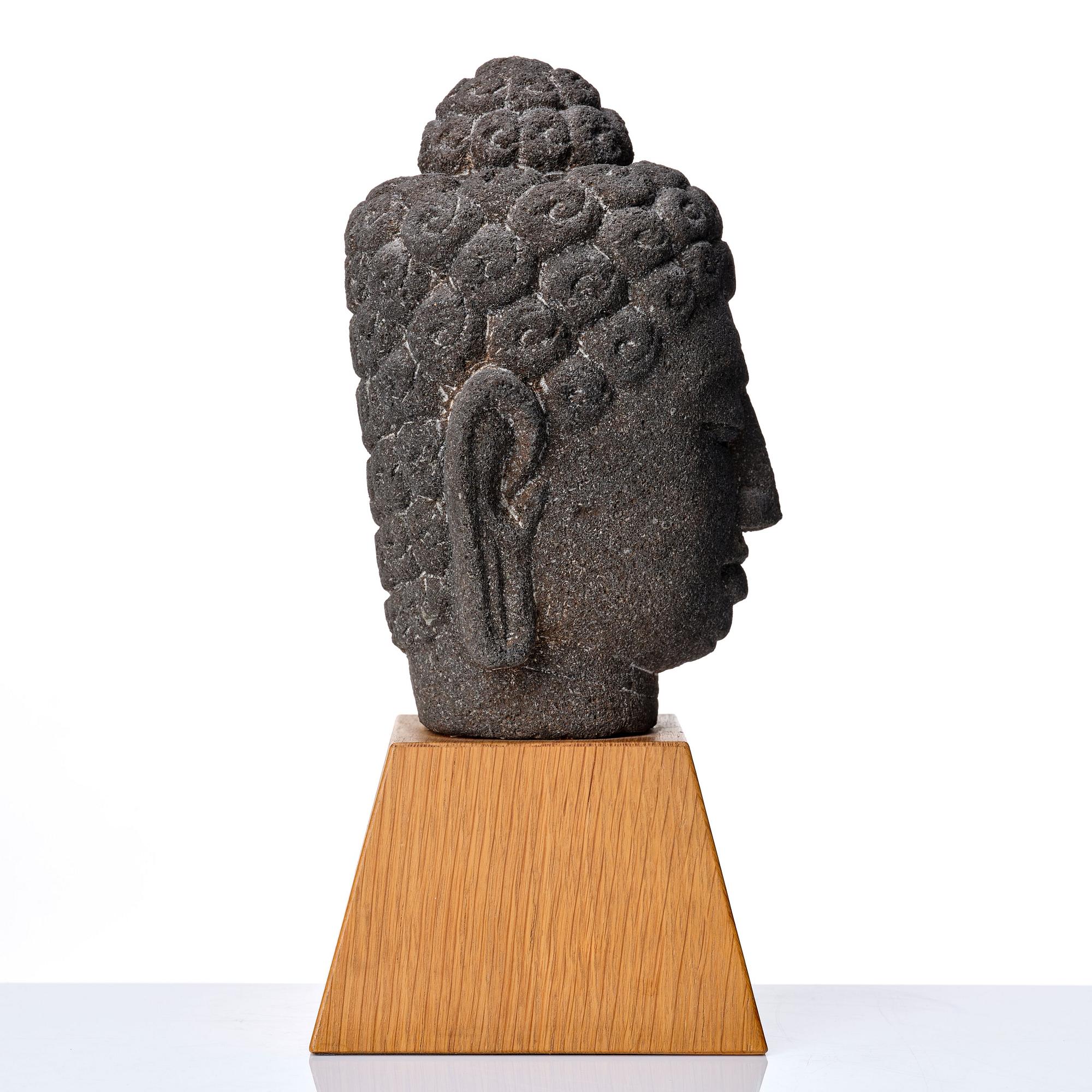 A Borobodur style Head of Buddha, Java.