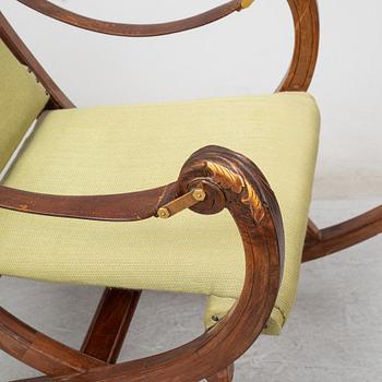 a late 19th century rocking chair.