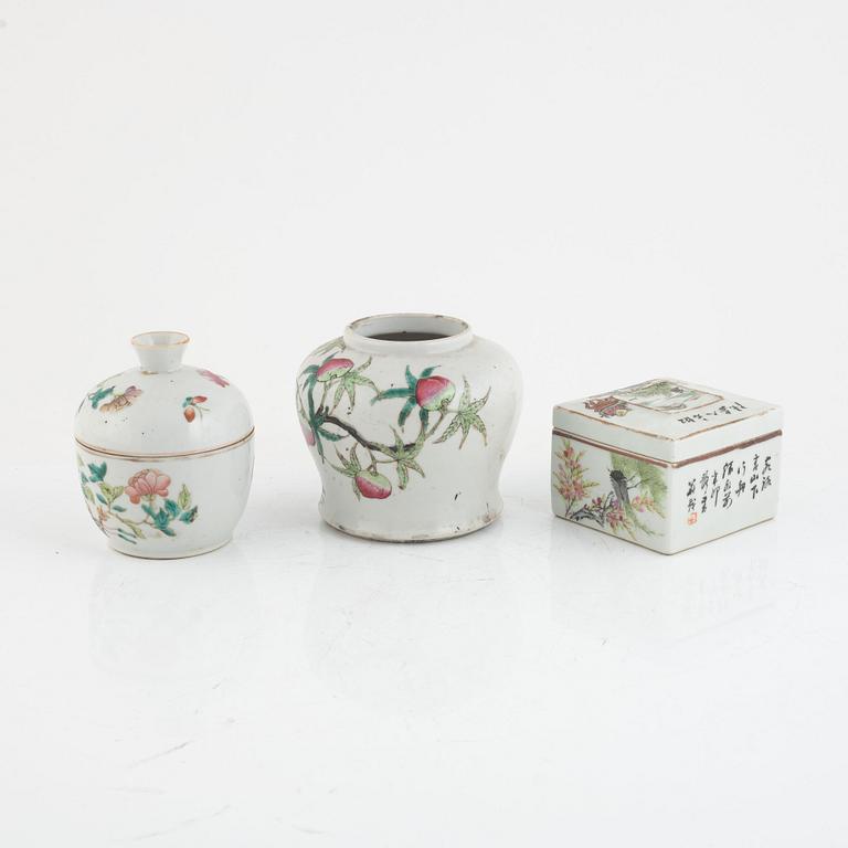 A Chinese famille rose peach vase, a jar and a box with covers, late Qing dynasty/20th century.