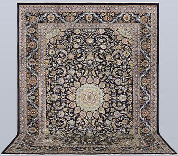 A Kashmar carpet, approx. 335 x 248 cm.