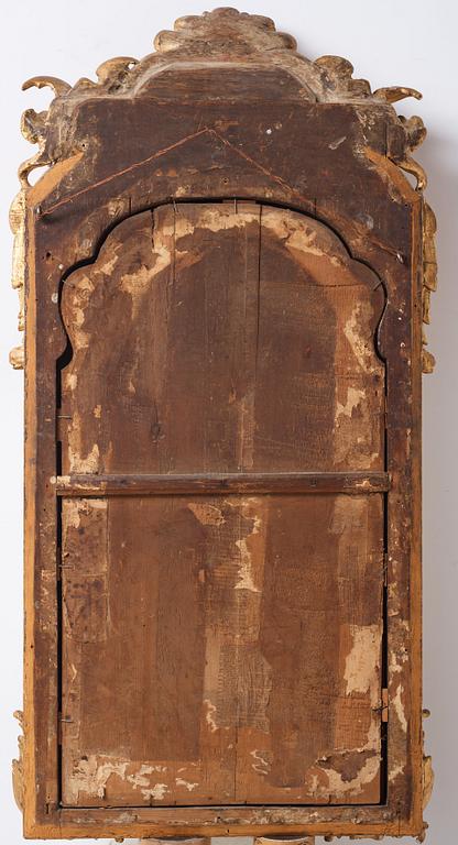 A Rococo dragon mirror.