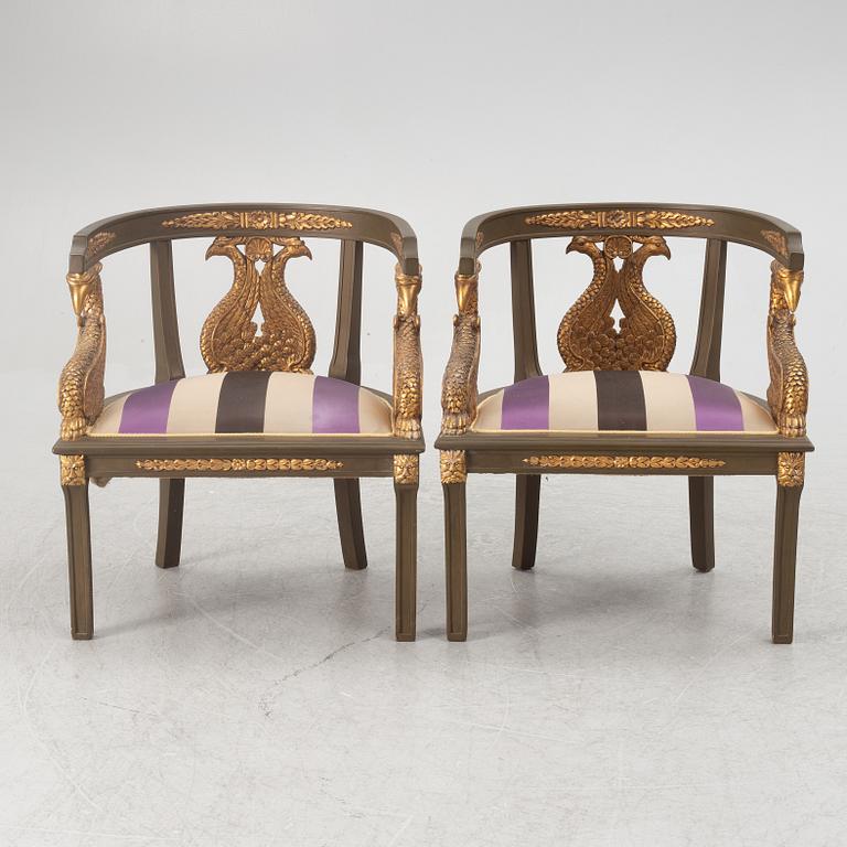 A pair of chairs and a side table, second half of the 20th century. Empire style.