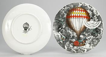 A set of nine Piero Fornasetti 'Mongolfiere' plates, Milan, Italy.