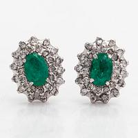 Earrings, 8K white gold with oval faceted emeralds and round brilliant and single-cut diamonds.