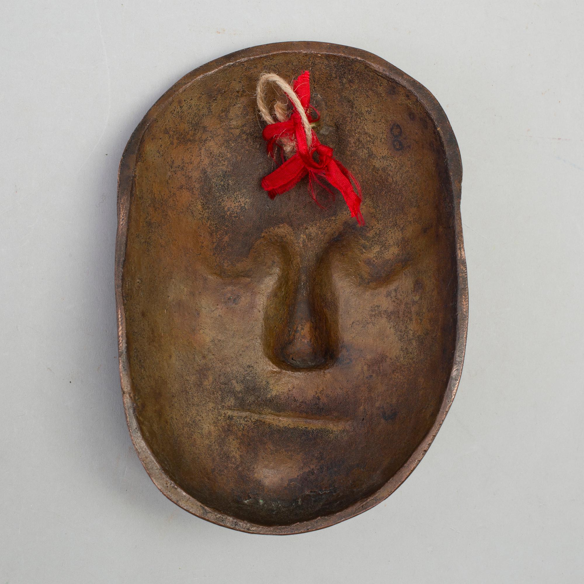 A death mask depicting King Charles XII. Probably by Finspångs ironworks, 20th century.
