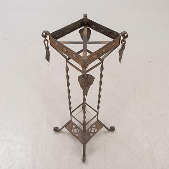 A metal pedestal and urn early 1900s.