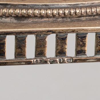 A pair of silver Gustavian style candle holder, C.G.Hallberg, Stockholm, 1909-1910.