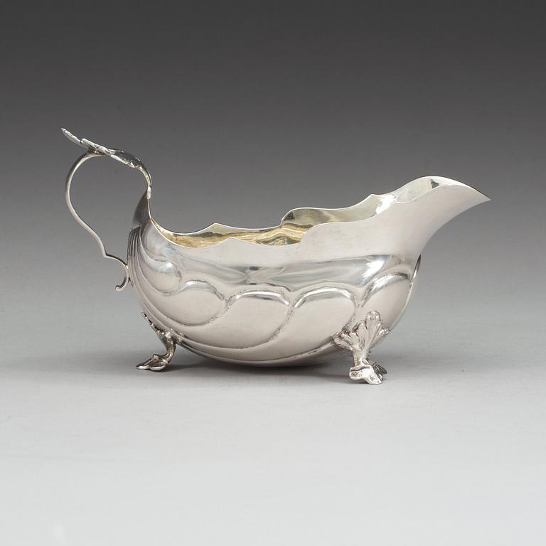 A Swedish 18th century parcel-gilt cream-jug, makers mark of Christian Rothe, Karlskrona 1777.