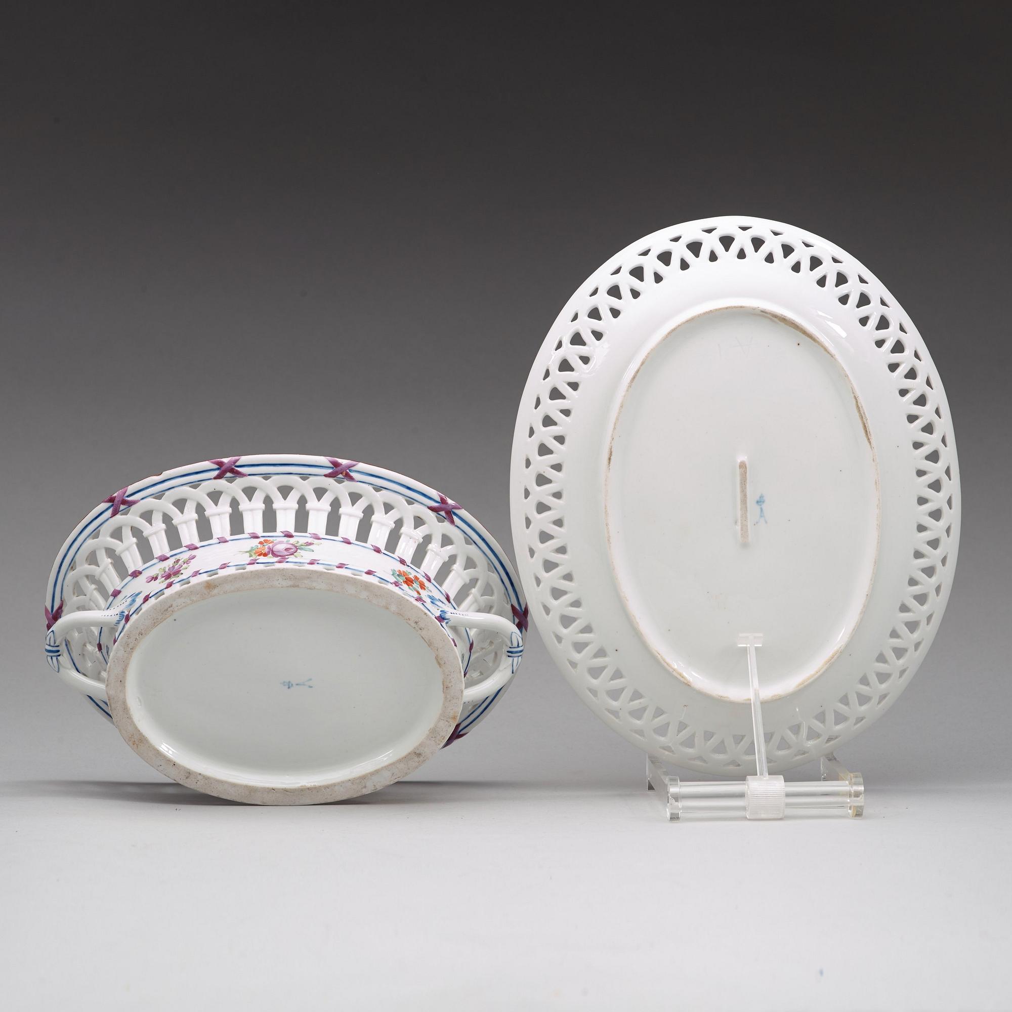 A Russian chesnut basket and stand, Imperial Porcelain Manufactory, St Petersburg, period of Alexander I (1801-25).