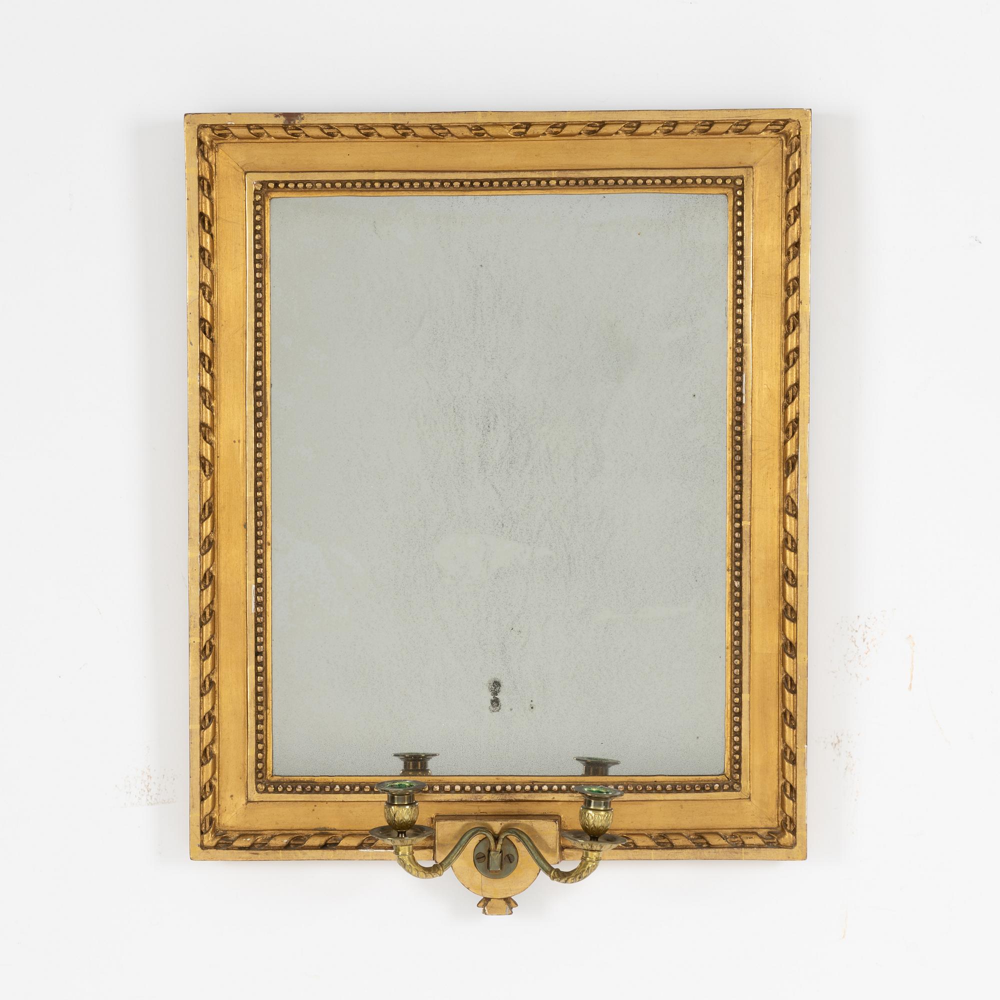 A Gustavian giltwood two-branch girandole, Stockholm, late 18th century.