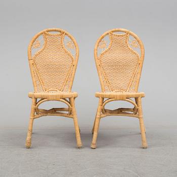 A pair of second half of the 20th cnetury rattan chairs.